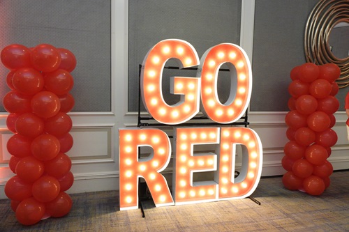 Large lighted letters spelling out Go Red